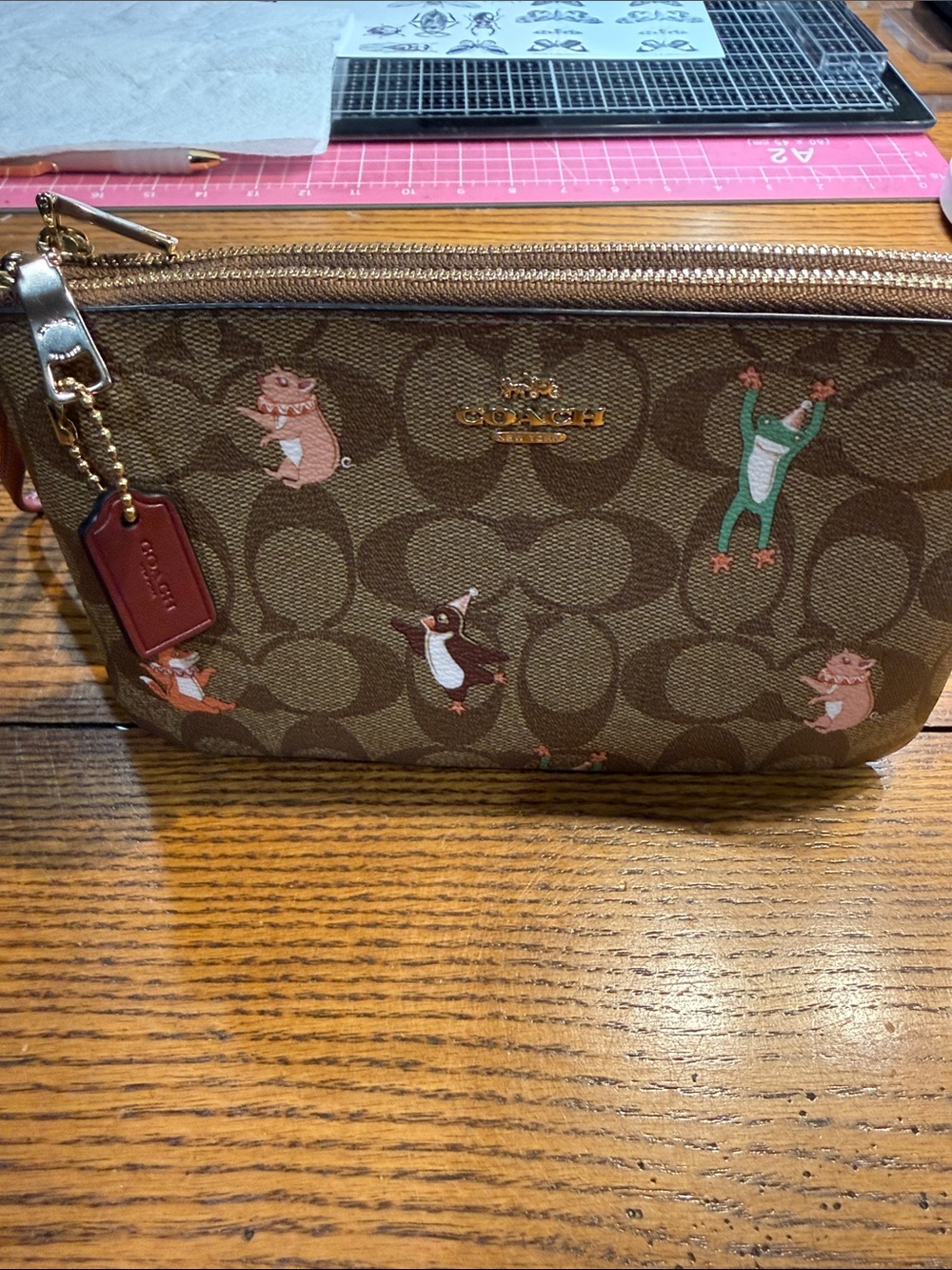 Coach Brown Signature Double-Zip Wristlet with Character Motif